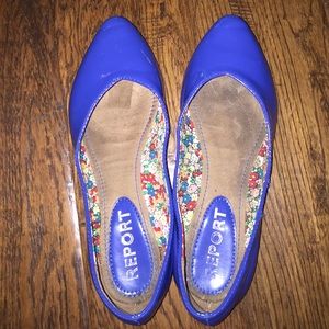 Blue glossy flats