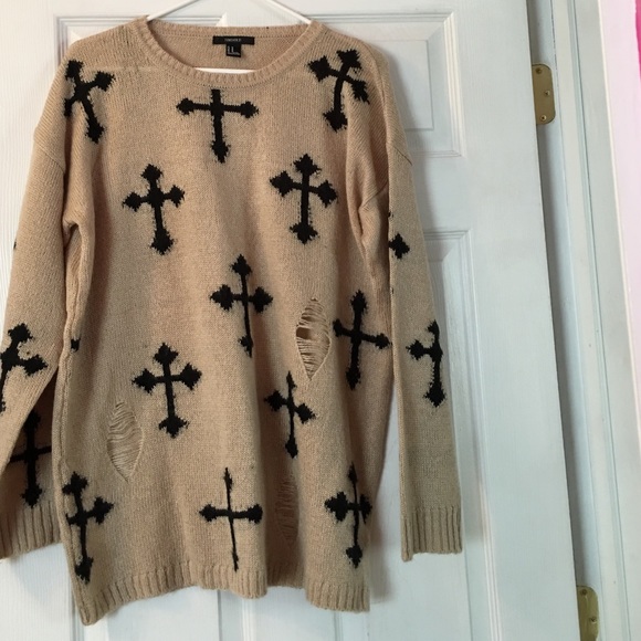 Distressed knit sweater.