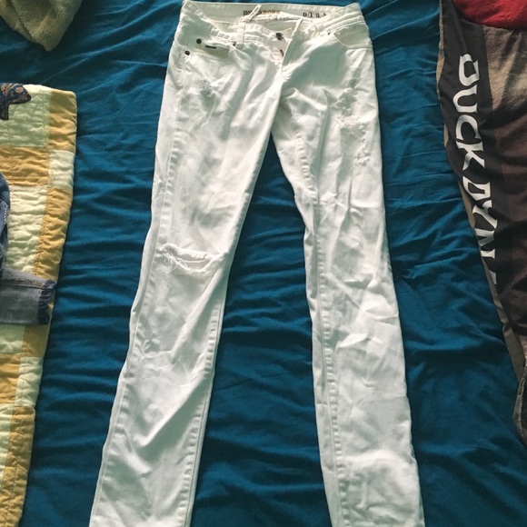 Billabong white skinny jeans.