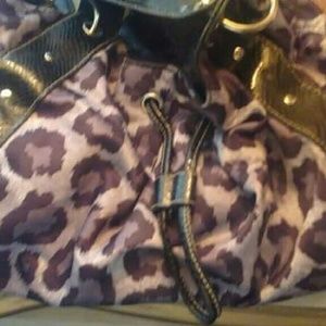 Black and grey cheetah print bag