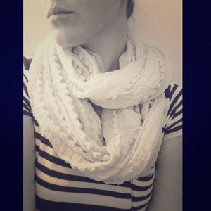 Francesca's teal textured loop scarf with pom poms