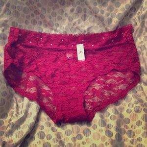 Magenta lace boy shorts underwear.