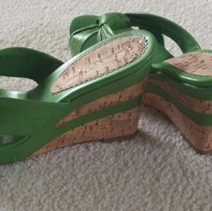 Open toe, lime green leather with cork wedge shoe.