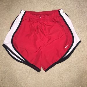 red, white, and black nike tempo shorts