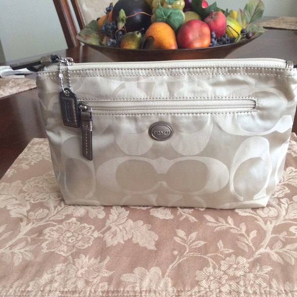 COACH  cosmetic pouch.