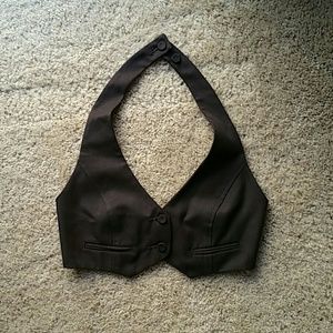 New with tags. Adorable mini vest, size SMALL