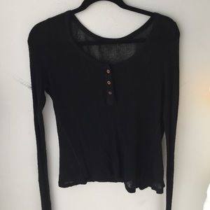 Partially buttoned brandy Melville cardigan
