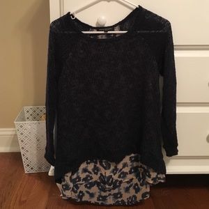 Never been worn cute blue sweater with back detail