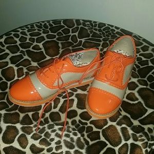 Orange & Tan Oxford. Never been worn