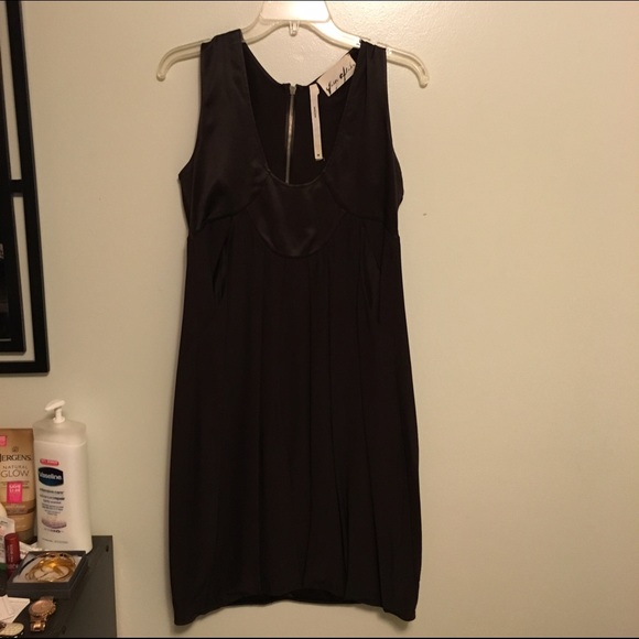 Yaya Aflalo of Reformation chocolate brown dress