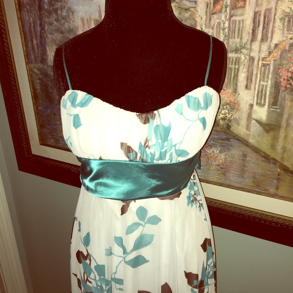 Cute white sundress with teal accents