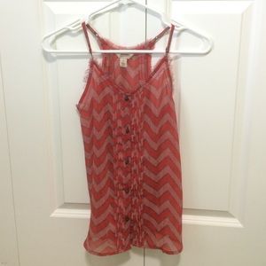 Sleeveless patterned button down blouse