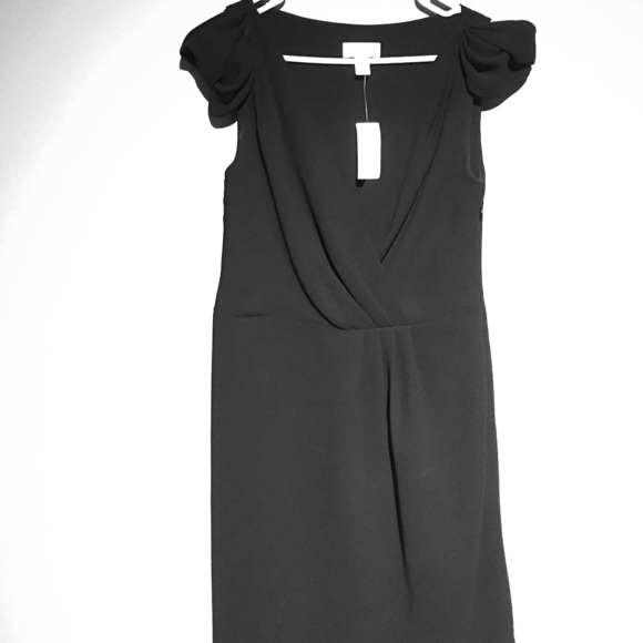 Black V-neck dress with ruffled cap sleeves