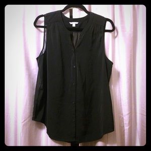 Sheer sleeveless top.