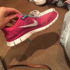 Pink nike 5.0 running shoes
