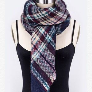 Navy plaid blanket scarf. $23.99 on our website