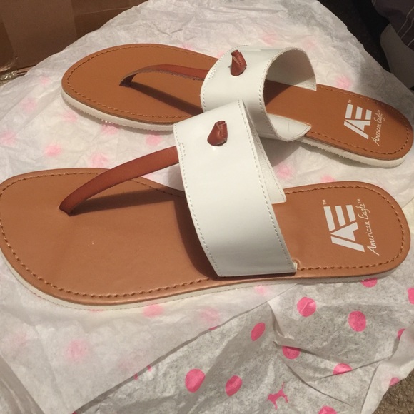 Tan and white sandals