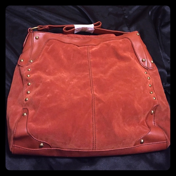 Gold studded handbag