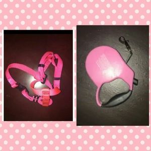 Pink dog harness and retractable dog leash