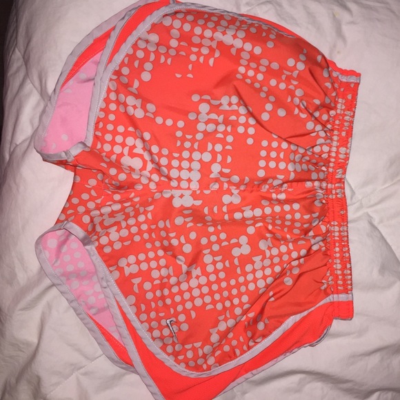 orange Nike shorts