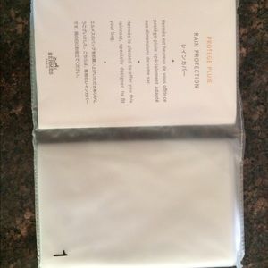 Authentic Hermes rain protection cover. Size 1.