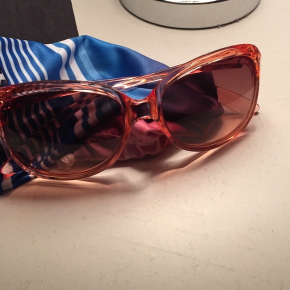 Brand new Peach oakleys