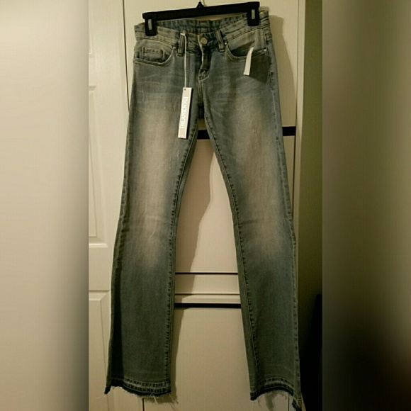 Blank NYC Denim Flared and Frayed Jeans