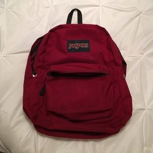 dark red Jansport backpack
