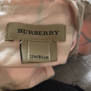 Pink Burberry plaid dress.