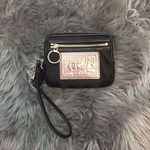 Black and silver Poppy Coach pouch