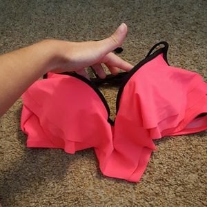 Neon pink bikini top.