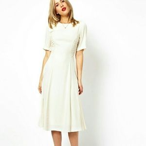 Off-white light, flowing dress