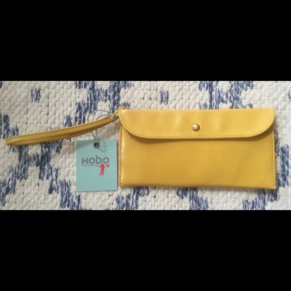 HOBO Handbags - HOBO Sunflower Yellow Leather Wristlet