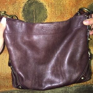 Brown leather coach handbag
