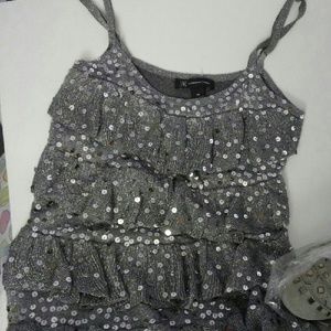 Sparkle n this holiday season in this shimmery top
