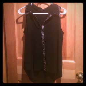 Black buttoned up blouse with leopard accent.