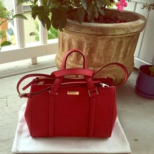 Gently used kate spade red small loden