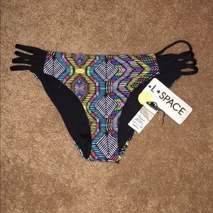 L SPACE TRIBAL PRINT REVERSIBLE BOTTOMS SMALL NWT