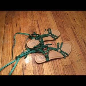 Strappy flat green sandals. Bought used.