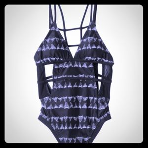 Shark tooth RVCA one piece