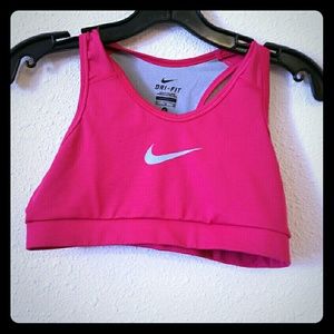 Hot pink and gray Nike sports bra