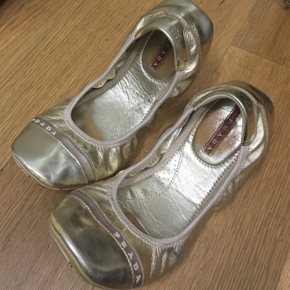 Gold Prada flats!