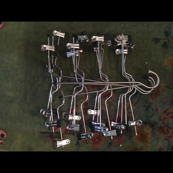 4 skirt hangers that can hold 4 skirts on each