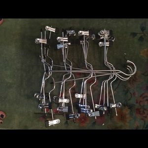 4 skirt hangers that can hold 4 skirts on each