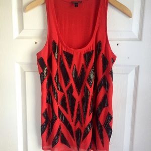 Express red tank with black embellishment