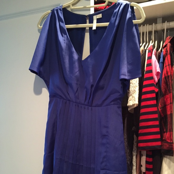 Open back Blue cocktail dress with pleated bottom
