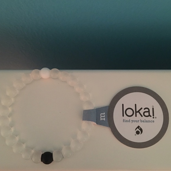 Brand new never worn clear lokai NWT
