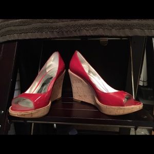 Get noticed in these adorable Red open toe wedges.