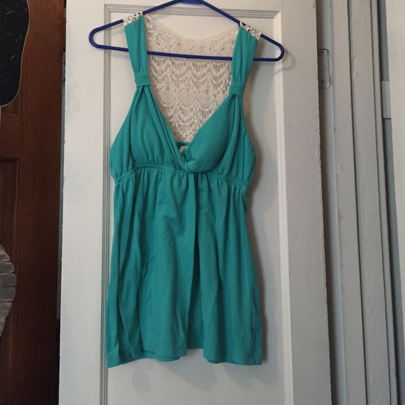 Super cute teal tank with laced back. - Picture 1 of 2