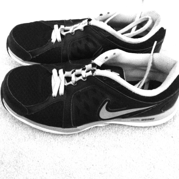 Black and White Nike tennis shoes.